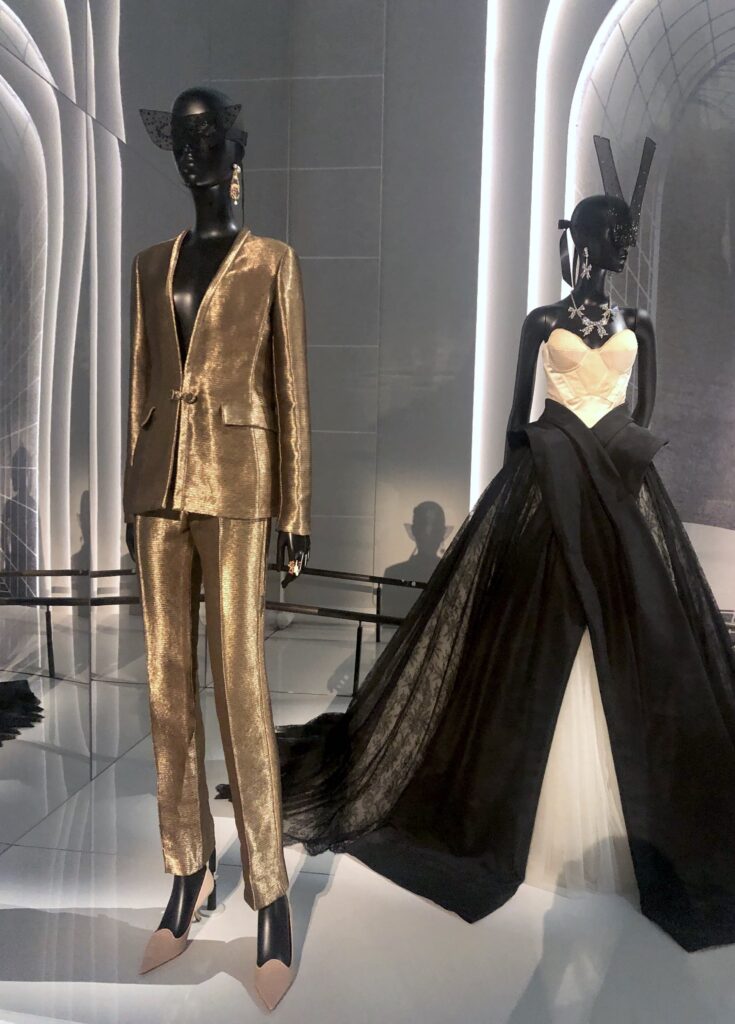 Gold dior suit and black and white evening gown